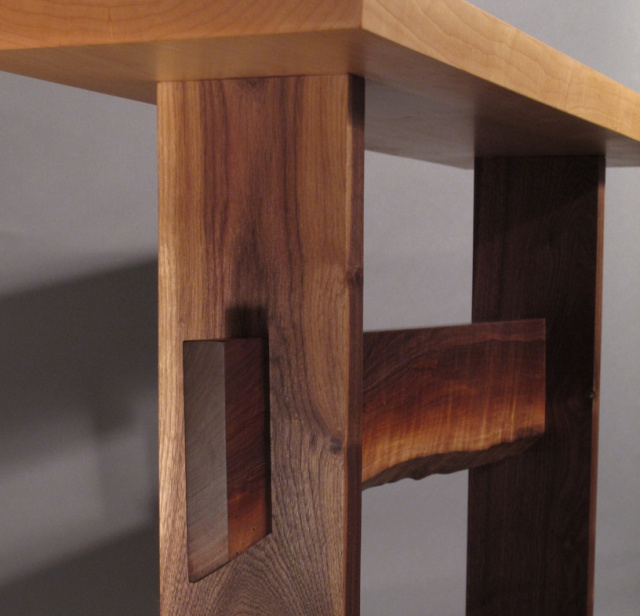 A live edge table stretcher is available on live edge walnut and live edge cherry tables